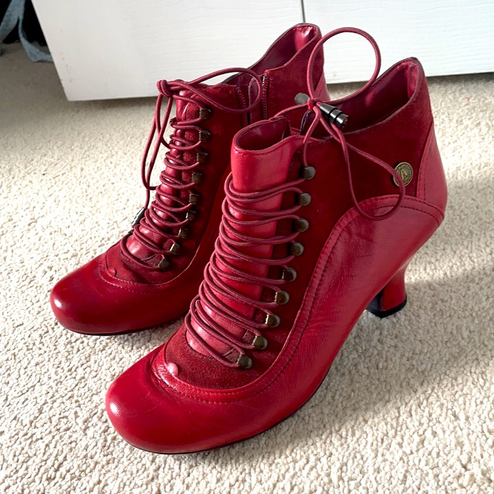 Red lace-up ankle booties